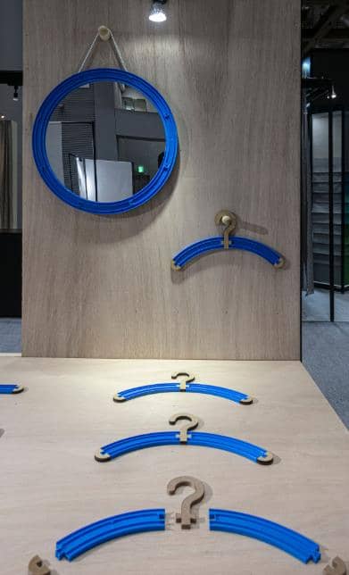 A mirror, tray and hangers by minna. A mirror, tray and hangers by minna.